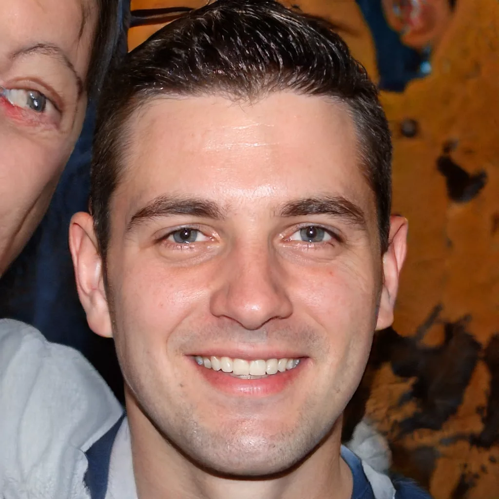 Labourer injured wrist while carrying materials when another handler unexpectedly let go.